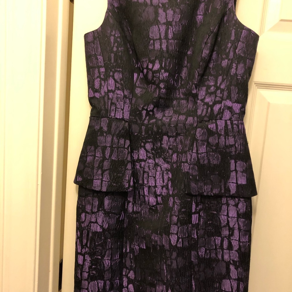 Purple cocktail dress with peplum